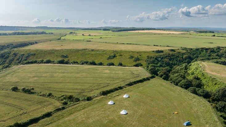 An aerial view of Weston Farm Campsite and the surrounding countryside, Dorset